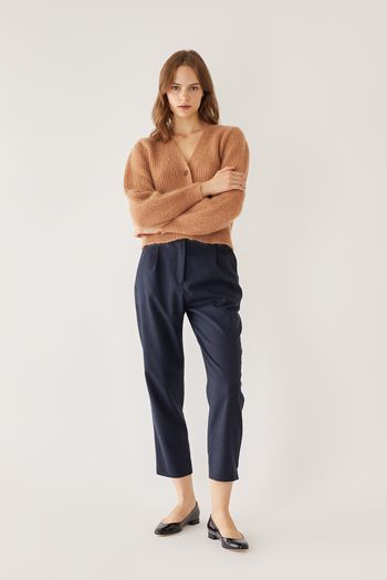 Tailored trousers with slits