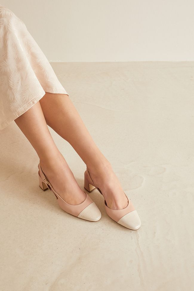 Bi-material slingbacks