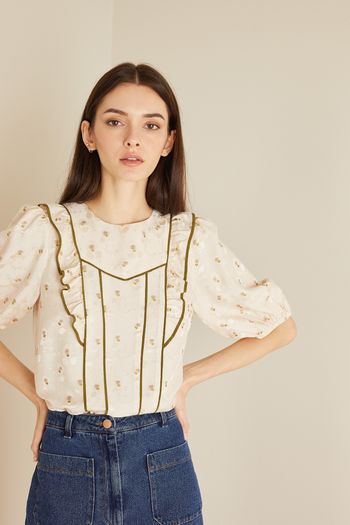 Blusa jacquard con profili a contrasto