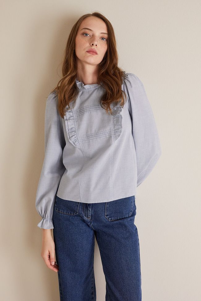Ruffle trimmed cotton blouse