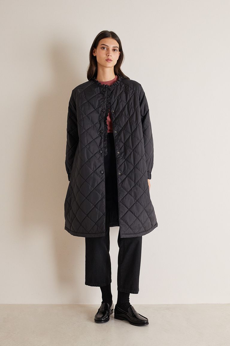 Coat with ruffles on sale in the back