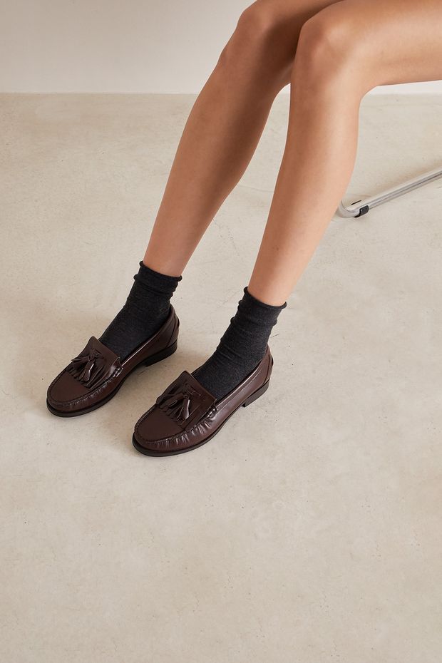 Penny loafers with tassel detail