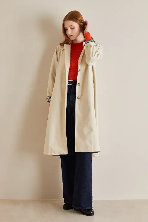 Duster coat with contrasting lining