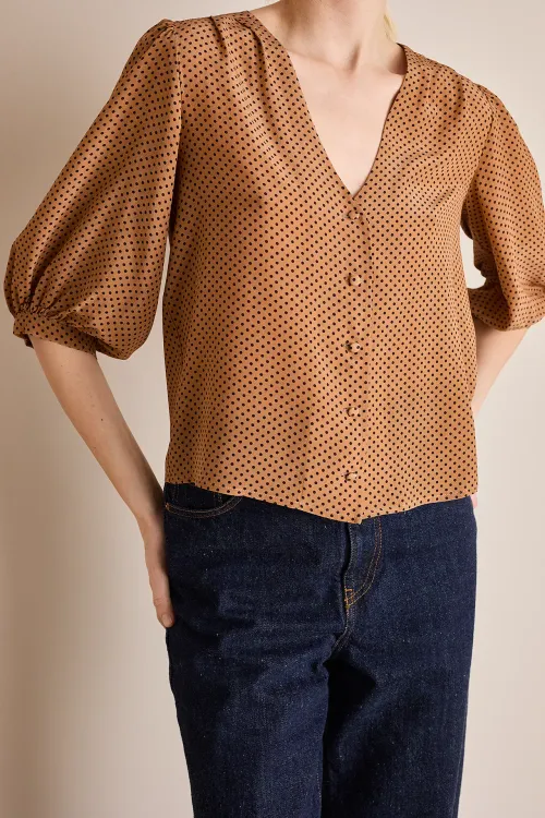 Silk top with fabric-covered buttons