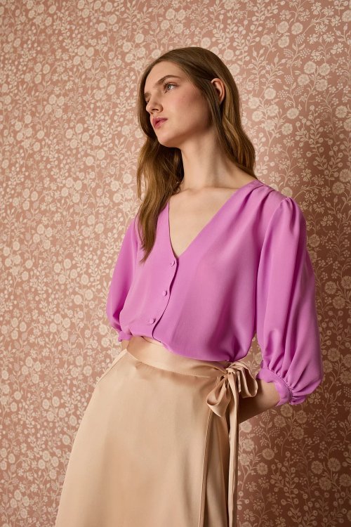 Silk blouse with fabric-covered buttons