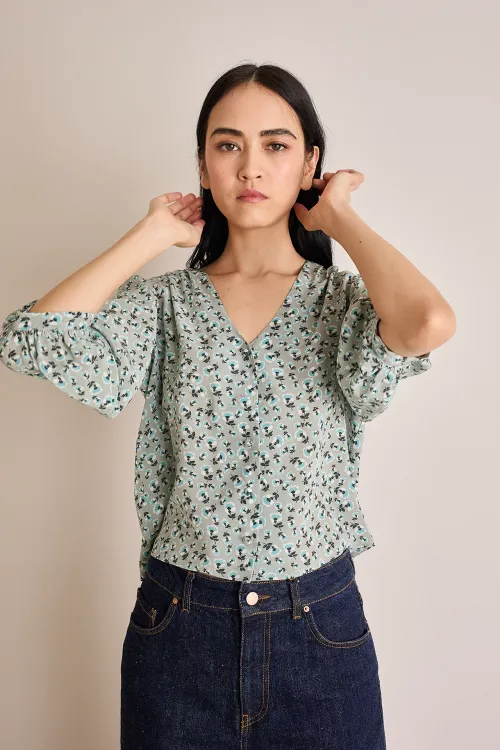 Silk top with fabric-covered buttons