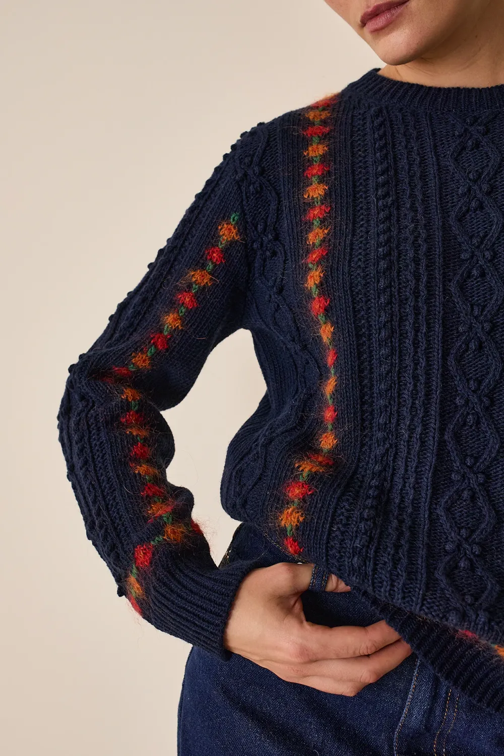 Cable-knit sweater with jacquard flowers