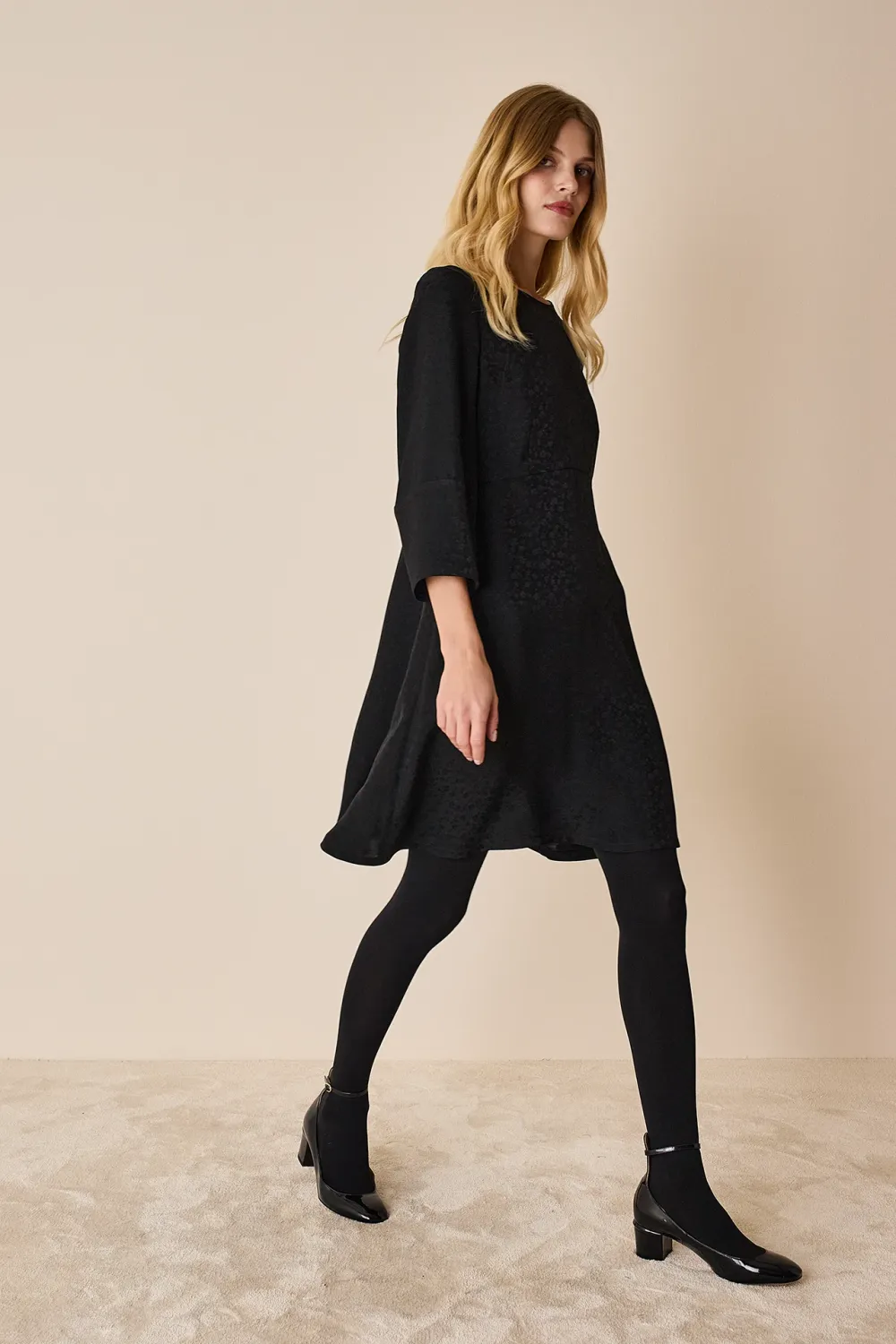 Jacquard dress with three-quarter sleeves