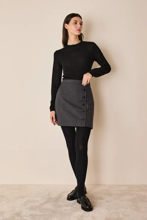 Mini skirt with side buttoning