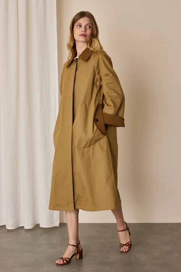 Trench coat with contrasting details