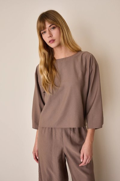 Blusa fluida con maniche ampie