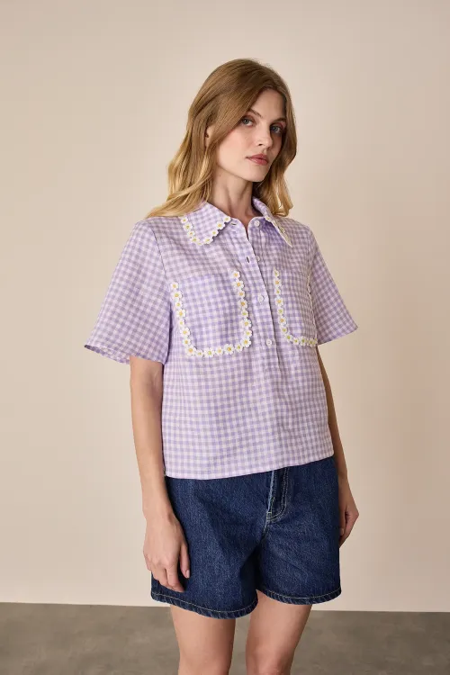 Polo con margherite