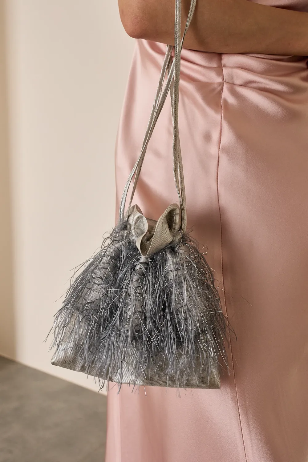 Feathered-look drawstring bag