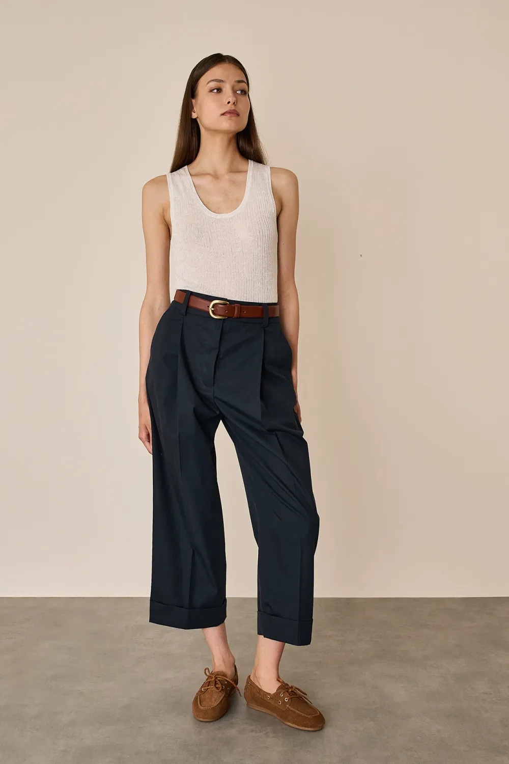 Pantaloni con piega e risvolto