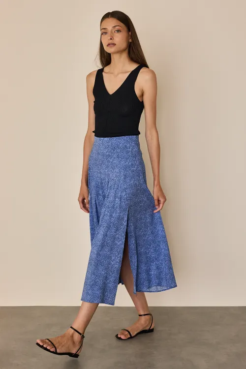 Fluid long skirt with pleated details