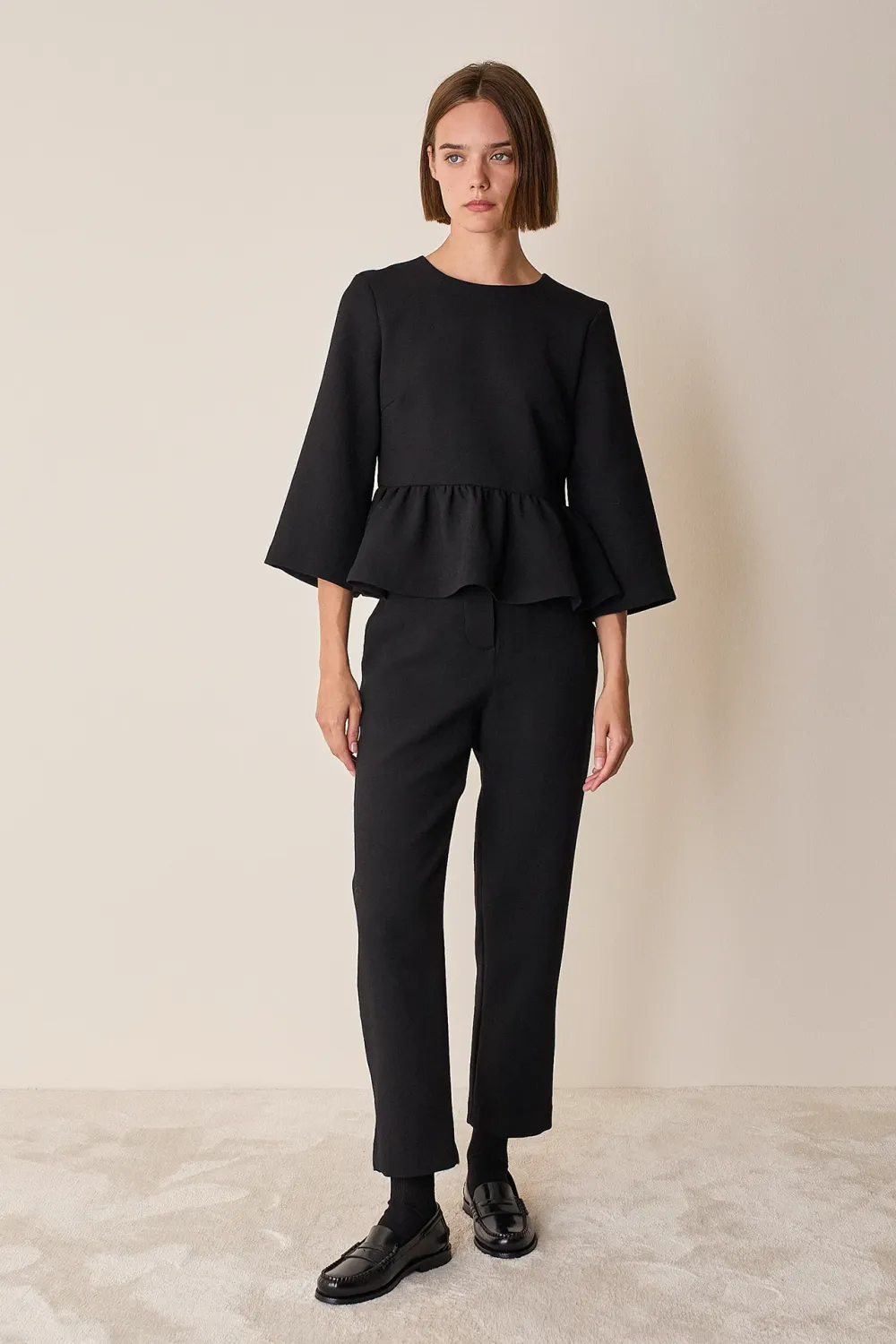 Top con balza in lana stretch