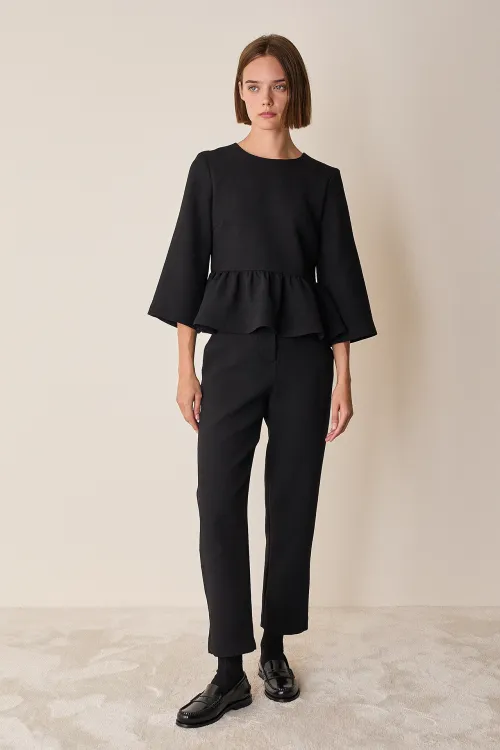 Top con balza in lana stretch