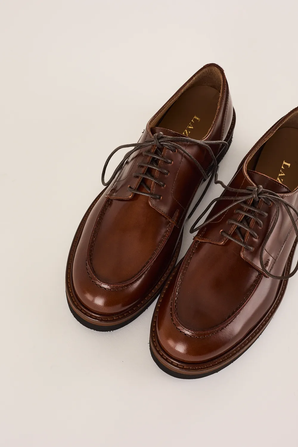 Scarpe stringate con suola alta in gomma